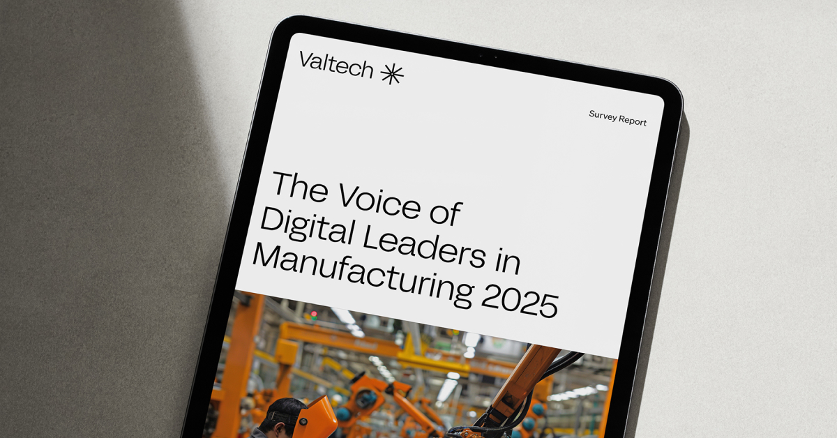 Tablet showing Valtech survey report: The Voice of Digital Leaders in Manufacturing, robotic arm.